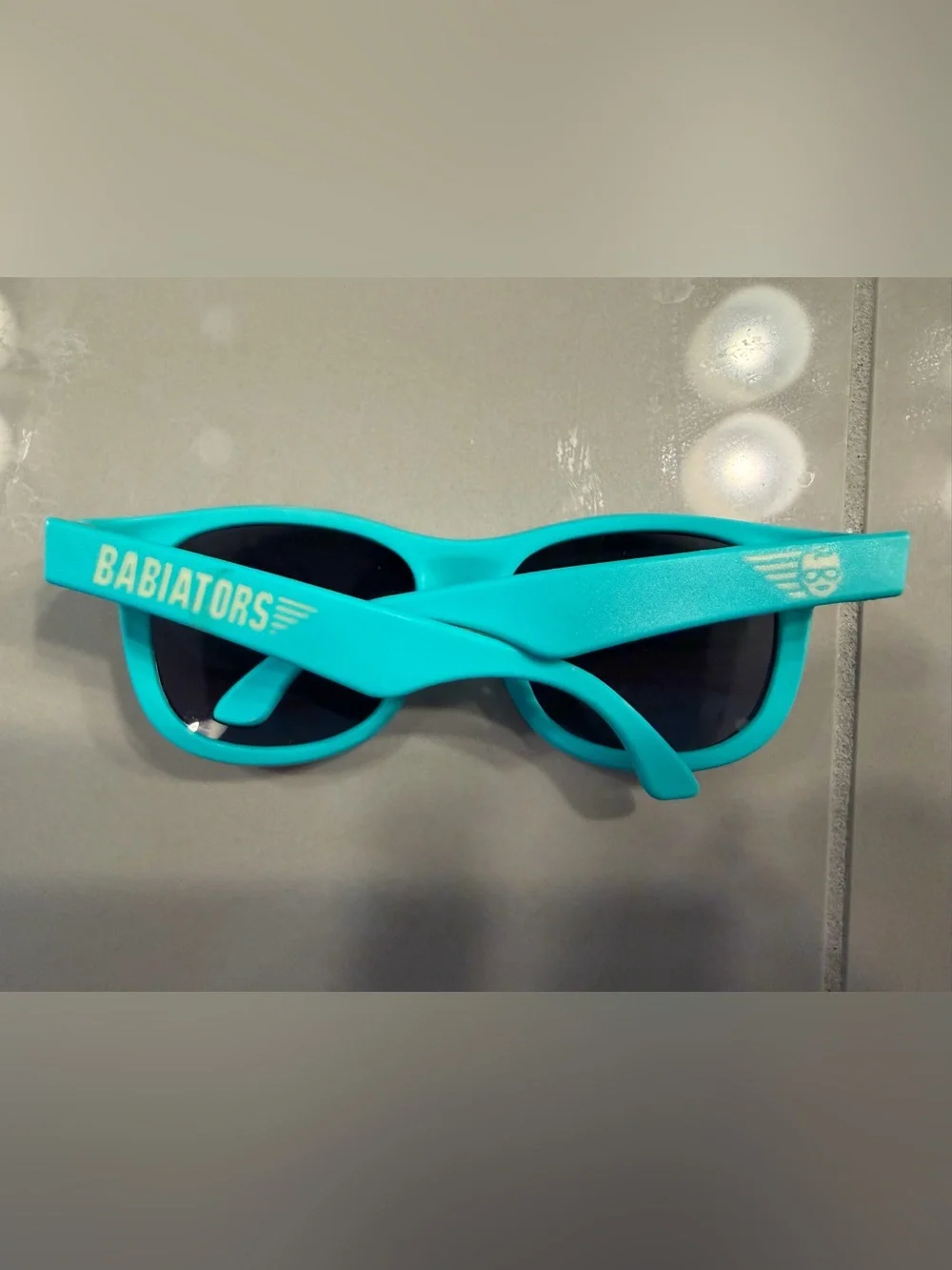 Babiators Kids Turquoise Sunglasses Age 0-2 with box